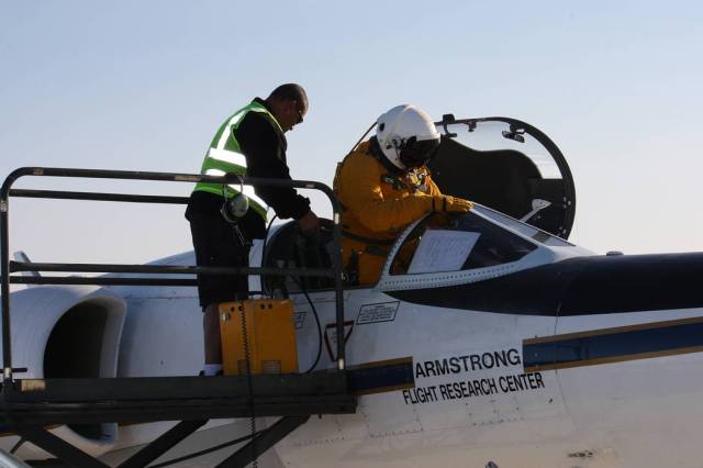 Pilot Stu Broce and Life Support Technician Wason Miles prep for ER-2 flight.