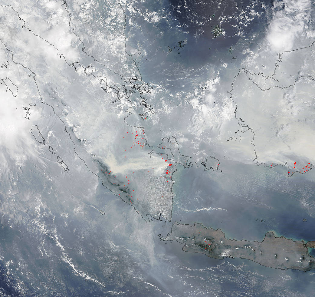 Smoke from fires hangs heavy over Indonesia