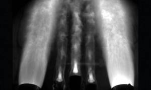 The 2-percent scale models of the SLS boosters and core stage engines are ignited for a 100 millisecond, hot-fire test.