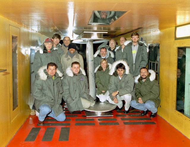 Group photo of technicians inside the Ice Research Tunnel.