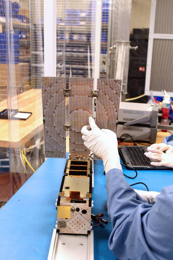 Integrated Solar Array and Reflectarray Antenna (ISARA)