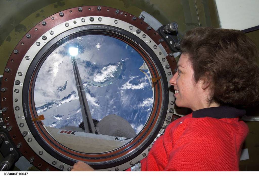Astronaut Ellen Ochoa Looks Through Station’s Destiny Lab Window