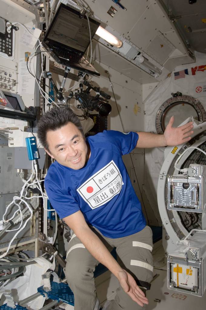 Japanese Astronaut Aihiko Hoshide from Expedition 33 showcasing the J-SSOD containing TechEdSat-1