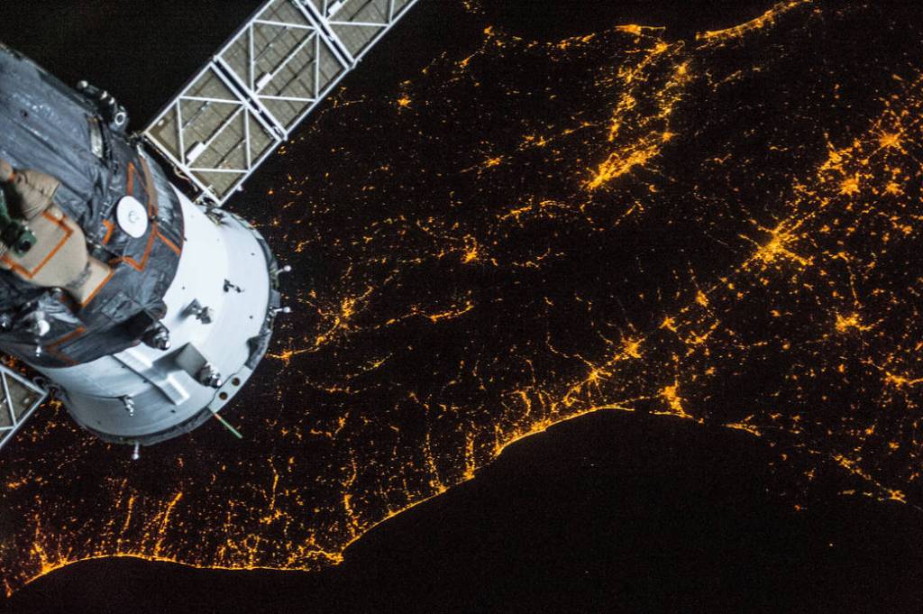 A Russian Soyuz vehicle and northern parts of Italy