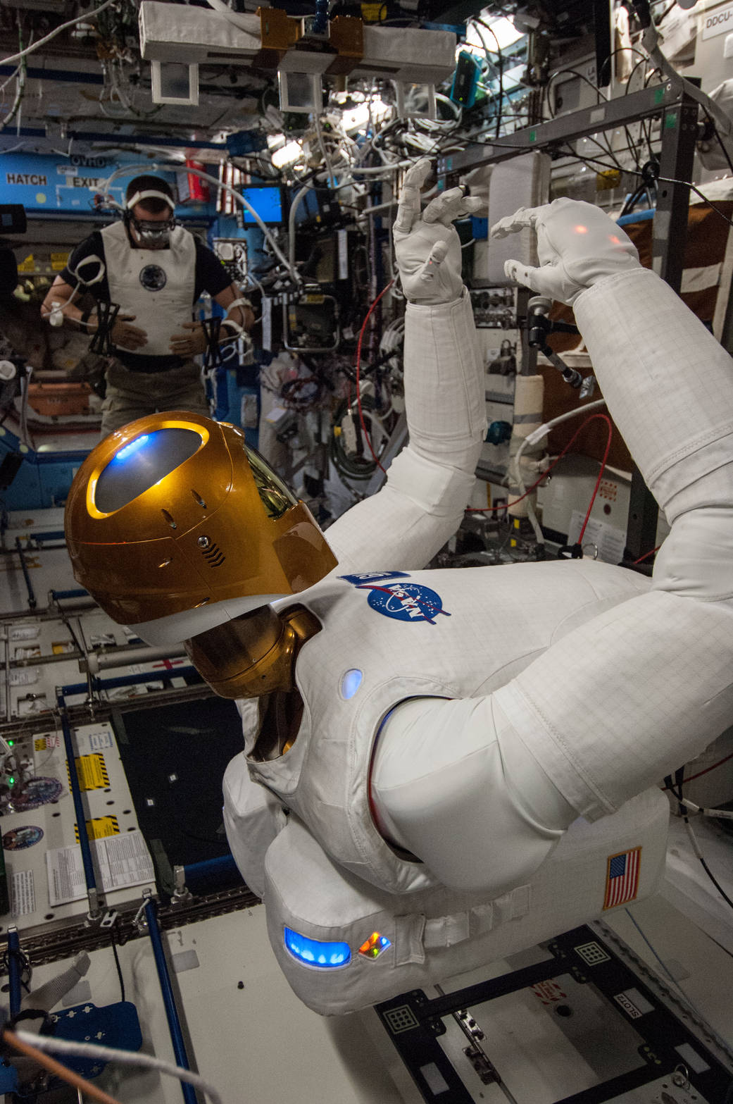 Astronaut Chris Cassidy and Robonaut 2