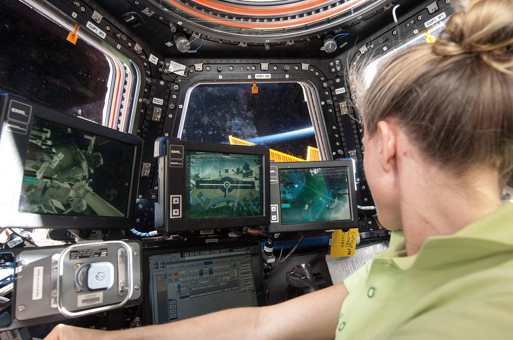At the robotics workstation in the International Space Station’s Cupola, NASA astronaut Karen Nyberg, Expedition 36 flight eng