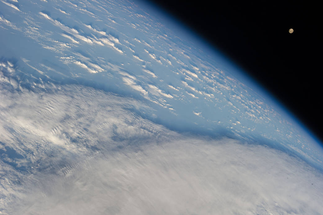 Earth's Horizon and Clouds Over the South Pacific Ocean