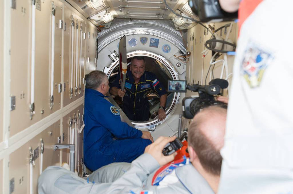 New Station Crew Arrives With Olympic Torch