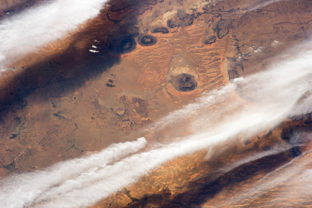 This photograph of cloud bands over southern Mauritania was taken from the International Space Station with an oblique angle suc