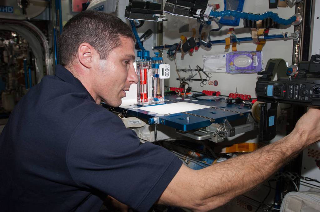 Astronaut Mike Hopkins With Capillary Flow Experiment