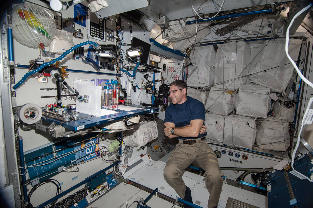 Michael Hopkins Works with the Capillary Flow Experiment