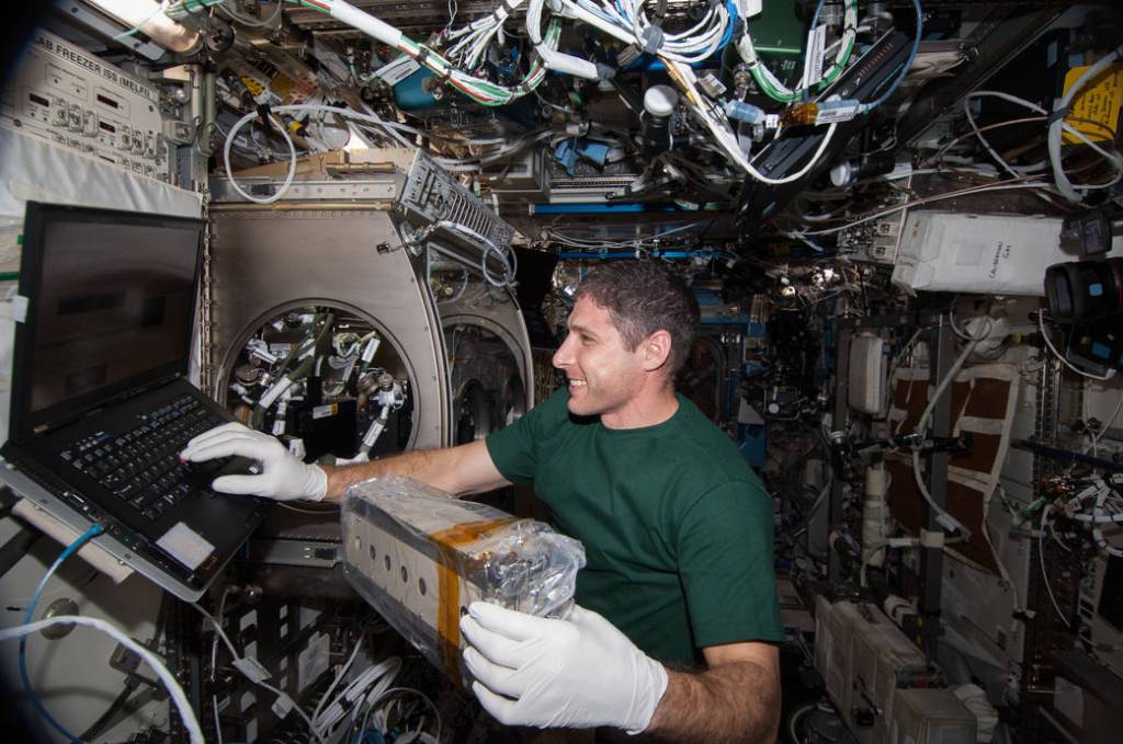 Astronaut Mike Hopkins Works With Station Science