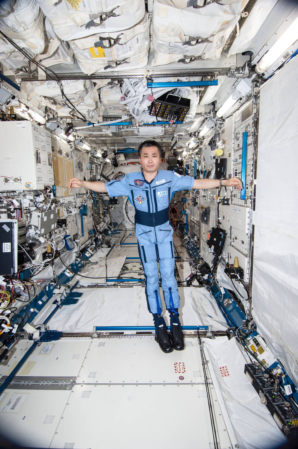 Koichi Wakata Wears the Penguin-3 Antigravity Suit