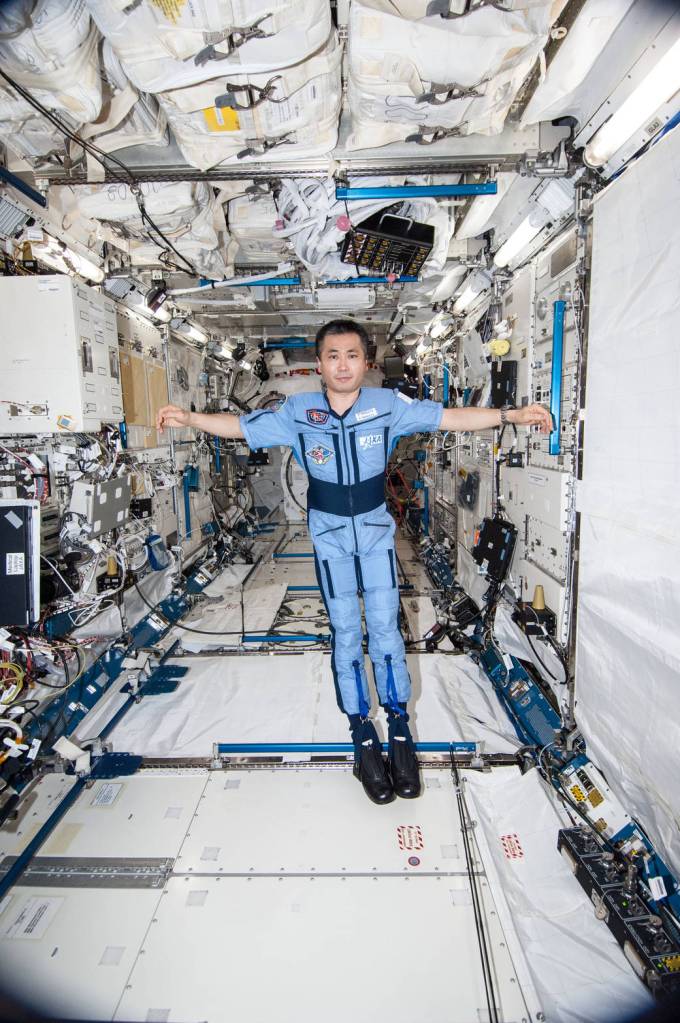 Koichi Wakata Wears the Penguin-3 Antigravity Suit