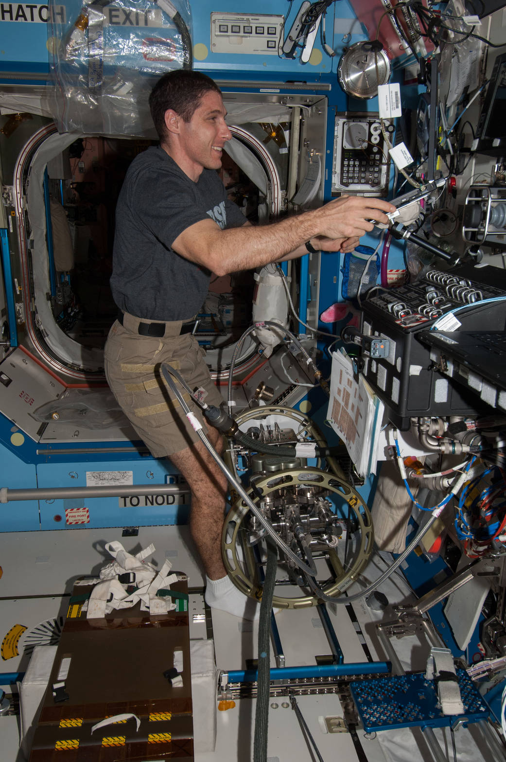 Mike Hopkins Refills the Internal Thermal Control System