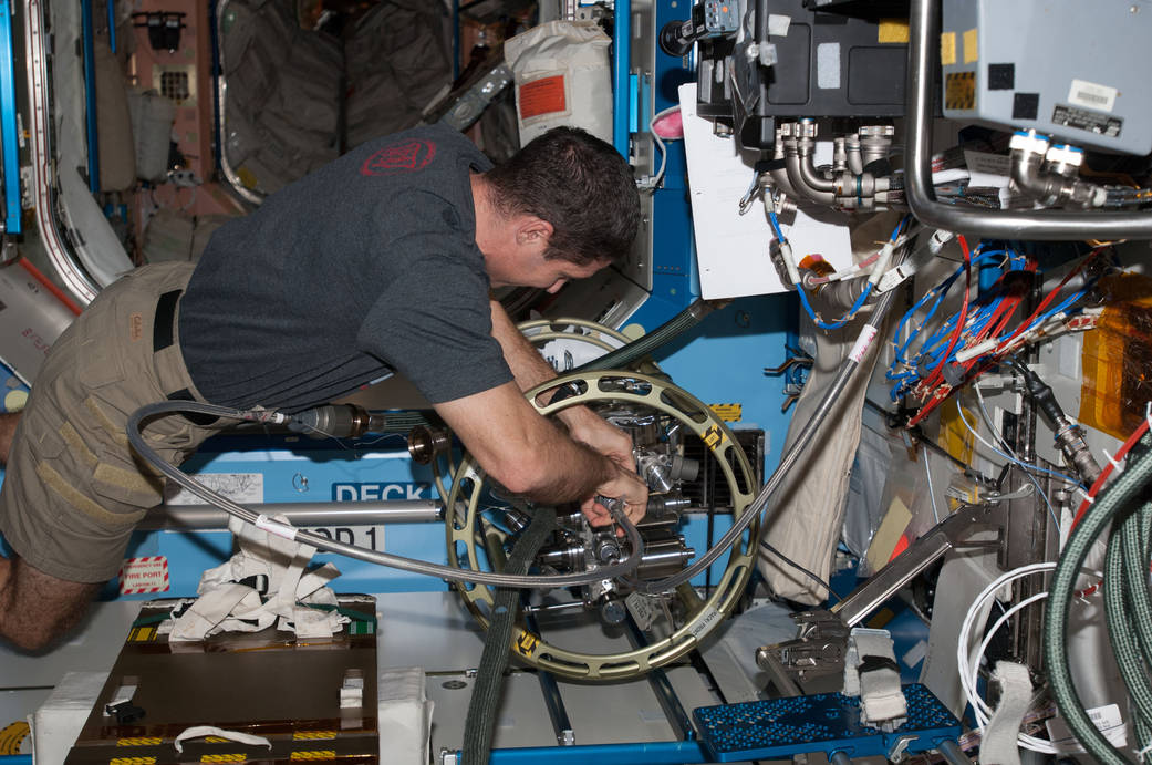 Mike Hopkins Refills the Internal Thermal Control System