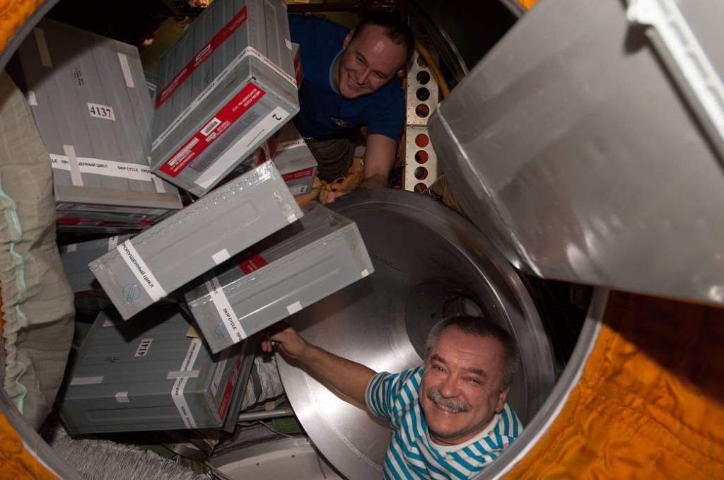 Station Cosmonauts Unpack Russian Progress Cargo Craft