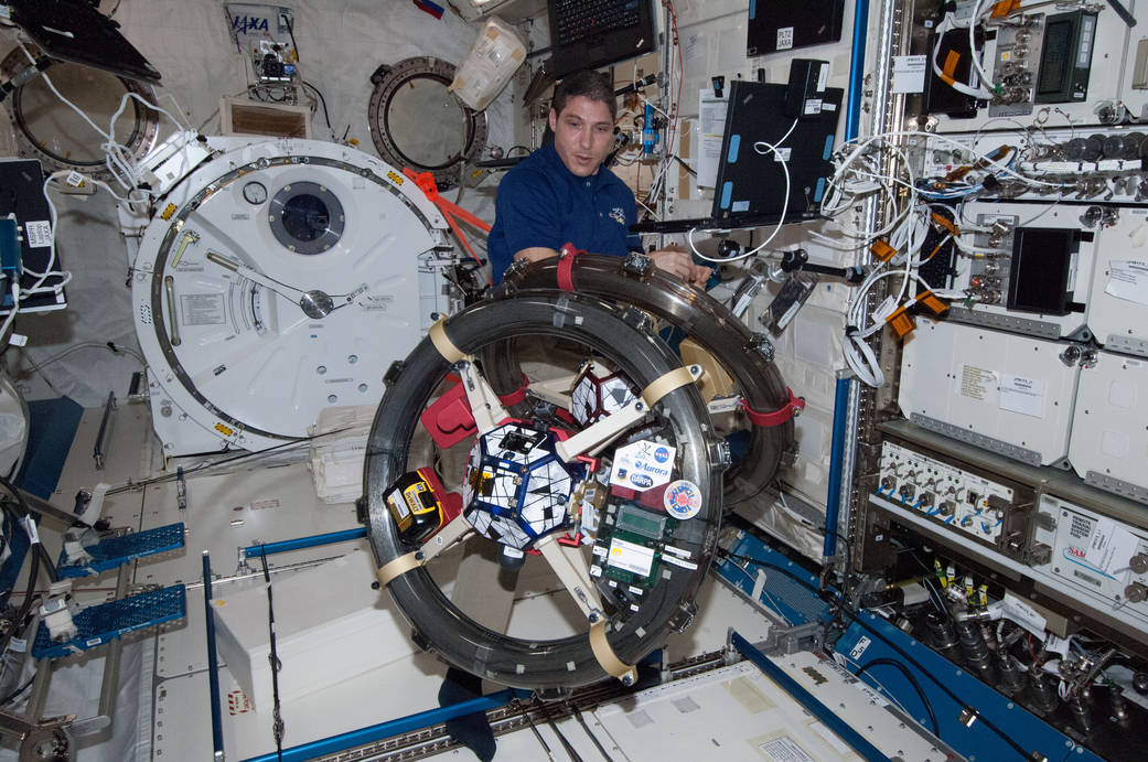Astronaut Mike Hopkins with SPHERES-RINGS