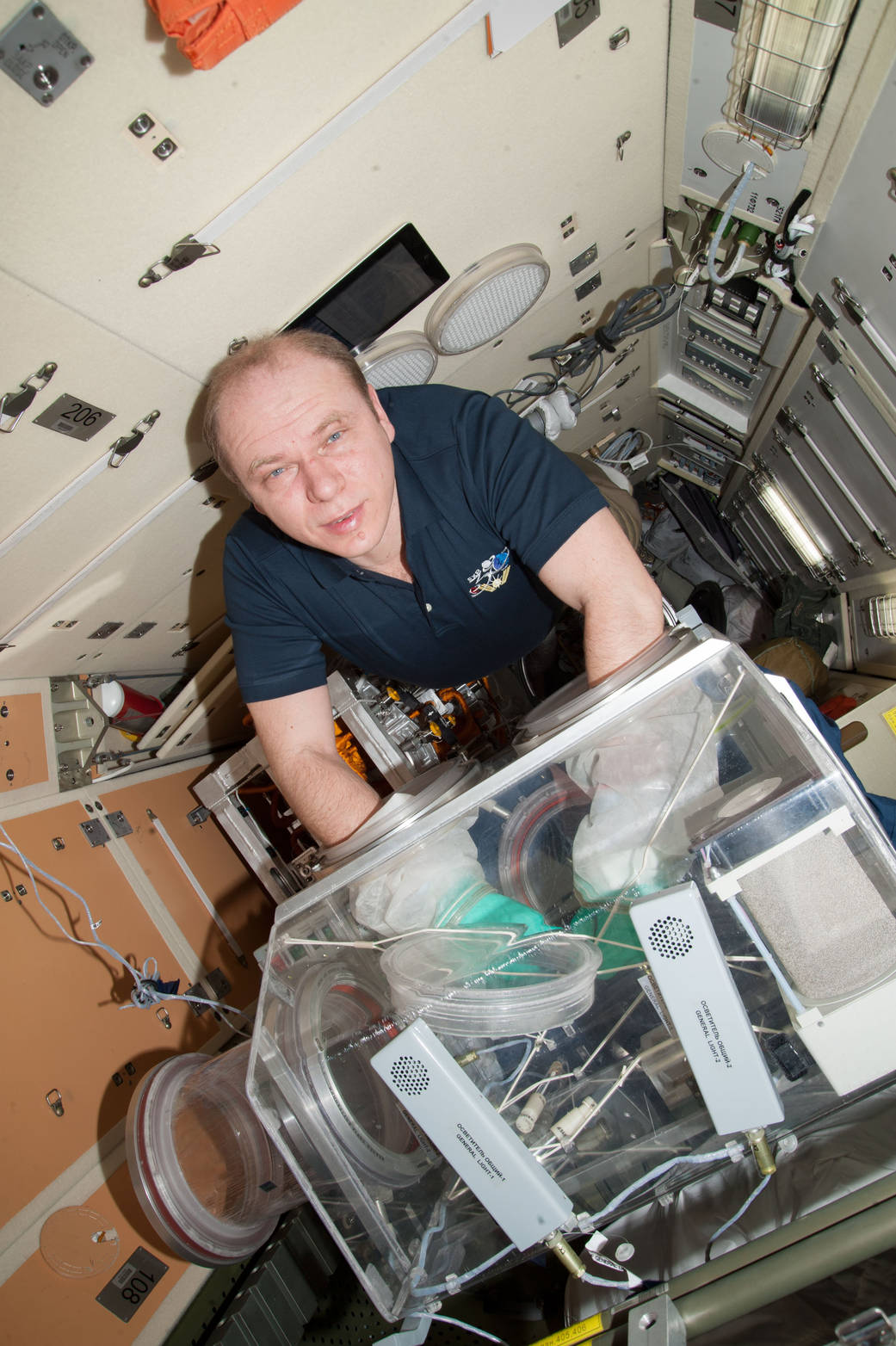 Oleg Kotov Works with the Bioscience Experiment