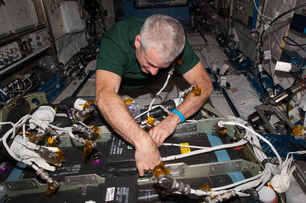Steve Swansonworks With the Carbon Dioxide Removal Assembly
