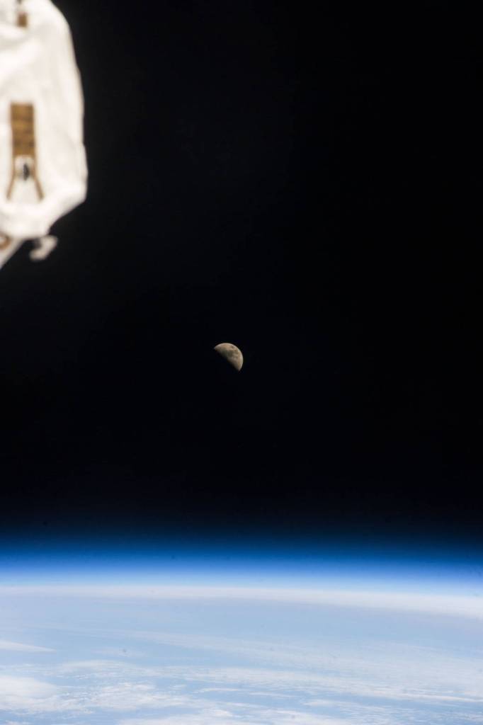 Half Moon above Earth’s Horizon