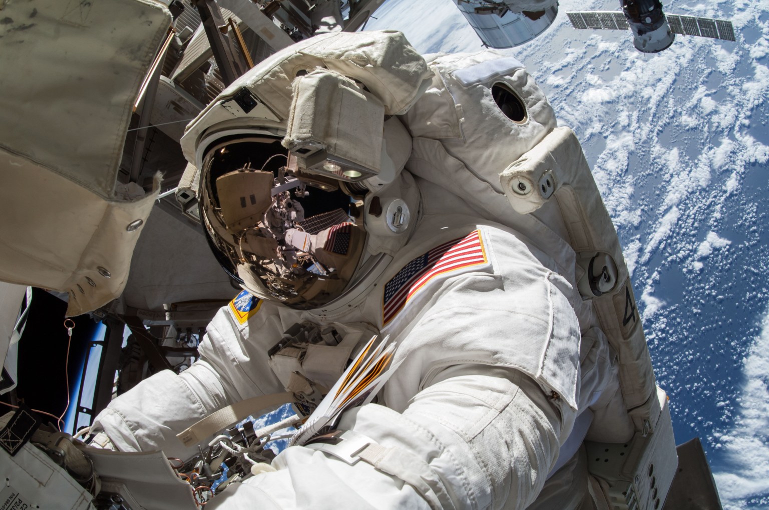 Extravehicular crewmember 2 (EV2) Barry Wilmore works at the P3 Truss during Extravehicular Activity 31