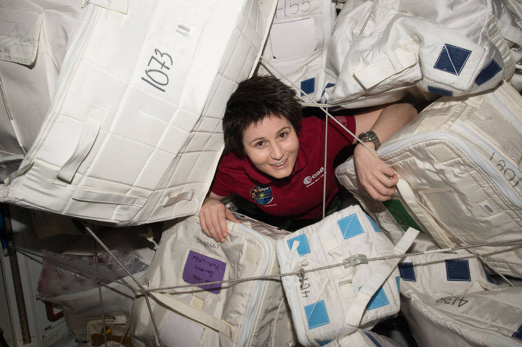 Samantha Cristoforetti glides through supply containers