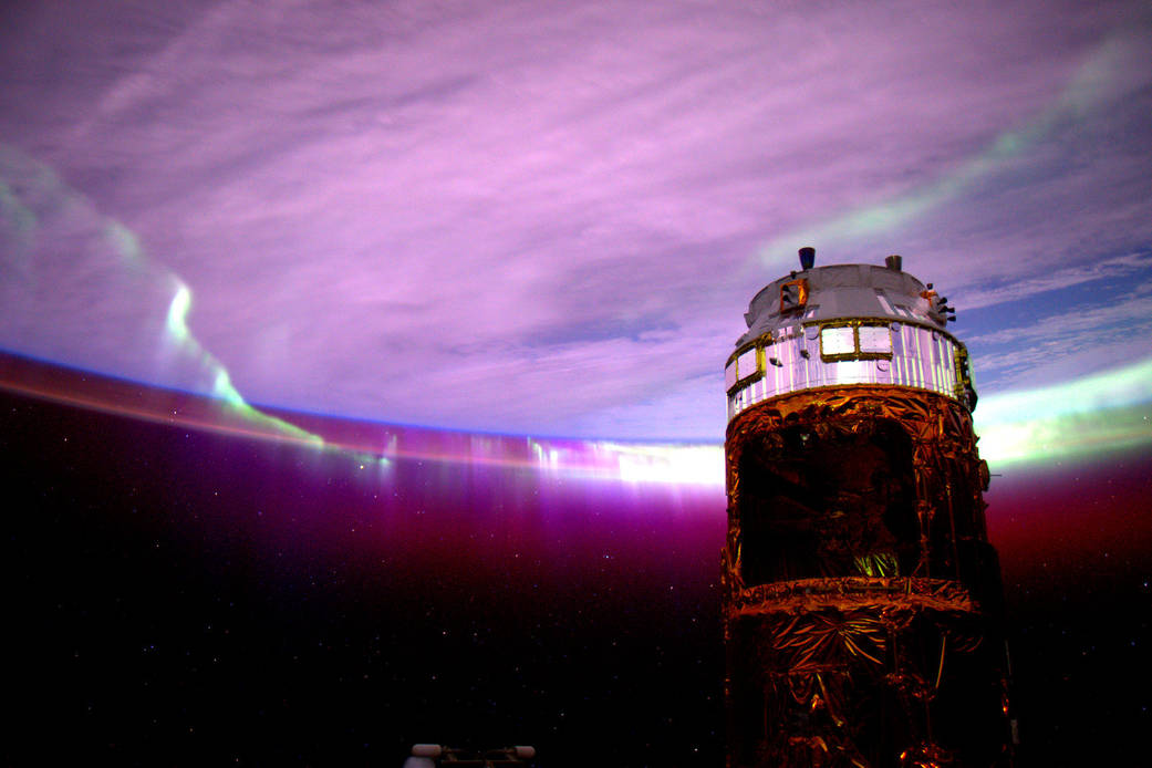 #Aurora's purple glow adds mystery to the nightscape.