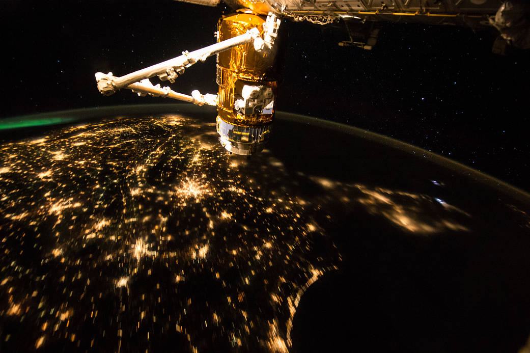 Lights of the United States at night photographed from the International Space Station with HTV cargo vehicle in foreground