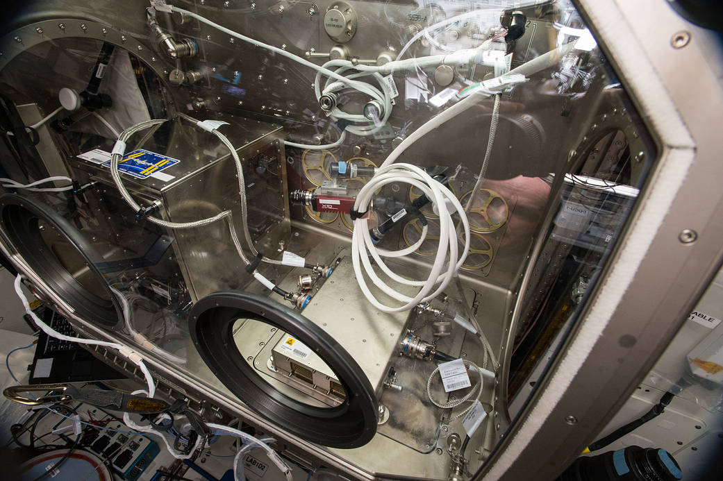 The 3D printer is reinstalled in the Microgravity Science Glovebox on the International Space Station. 