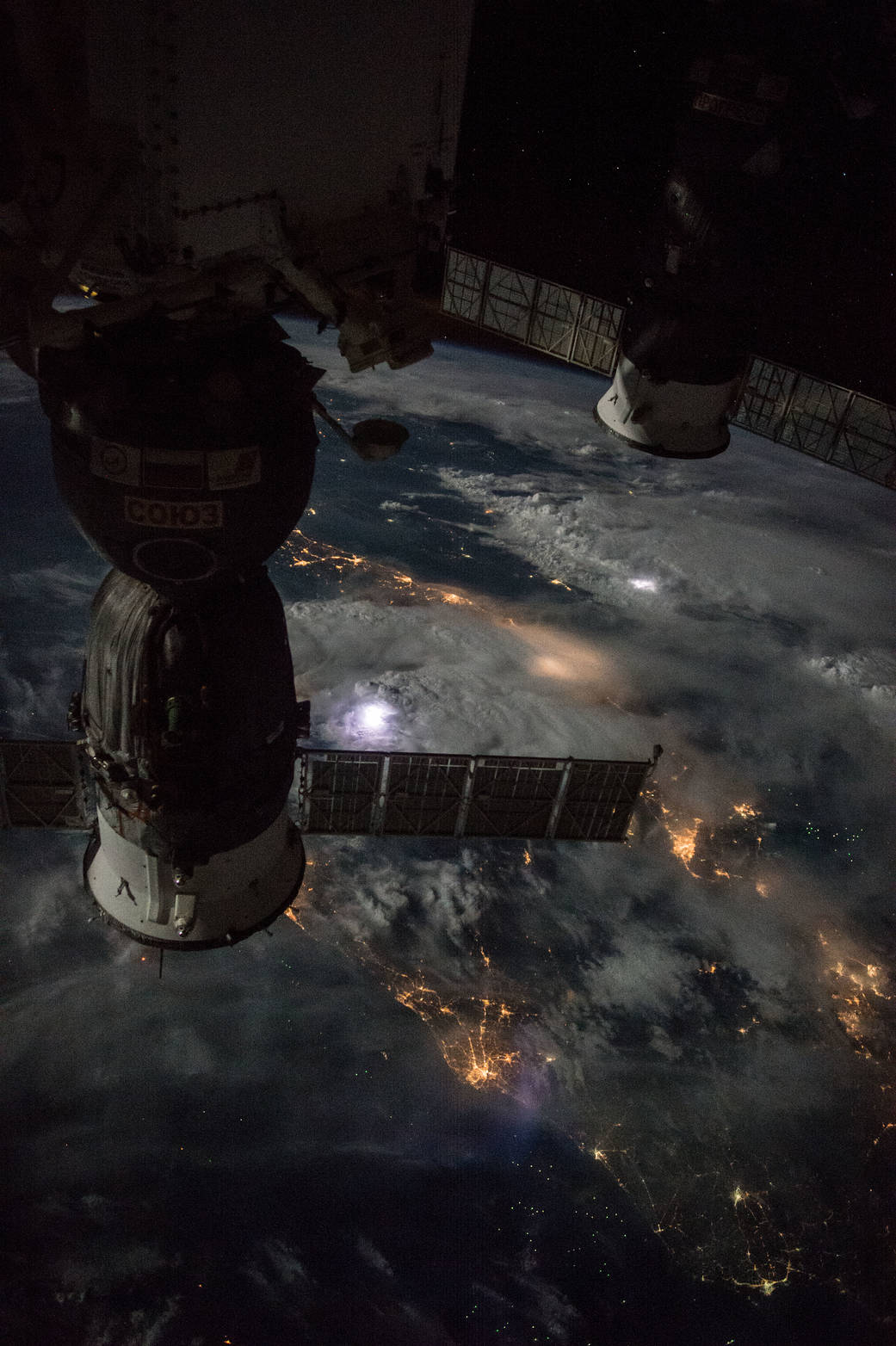 Thunderstorms Visible During a Nighttime Pass