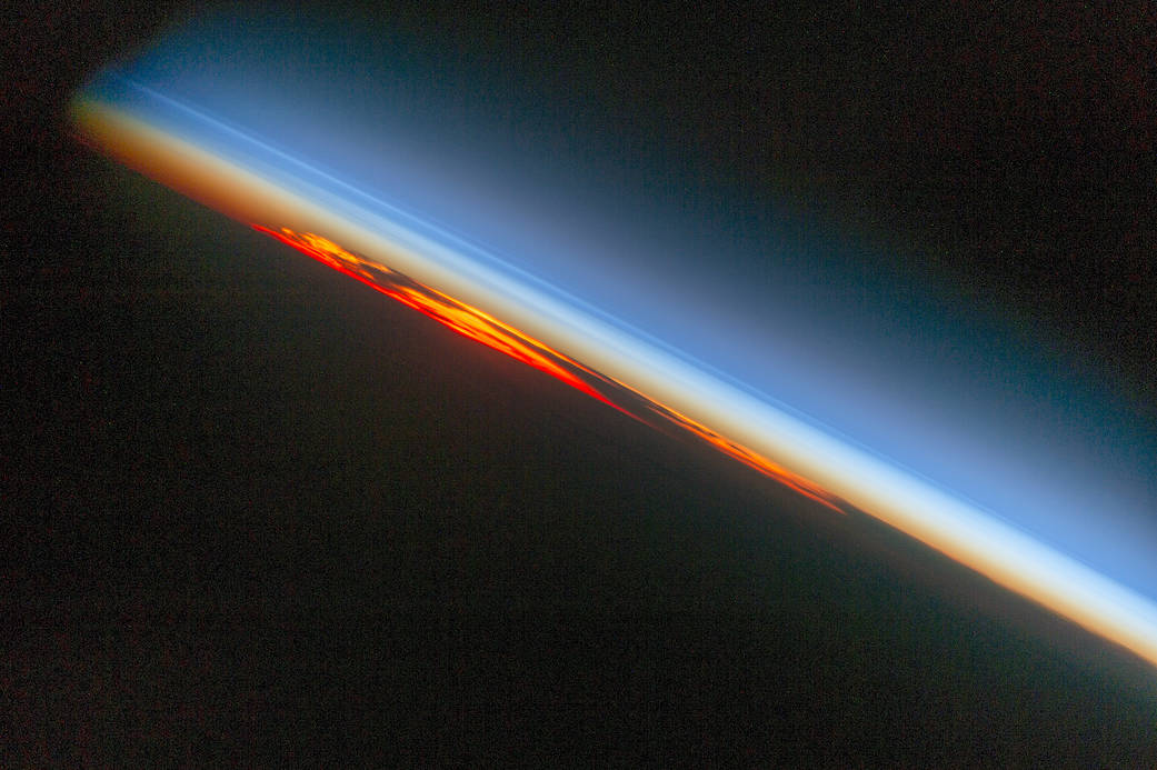Diagonal line of Earth's horizon during sunset 