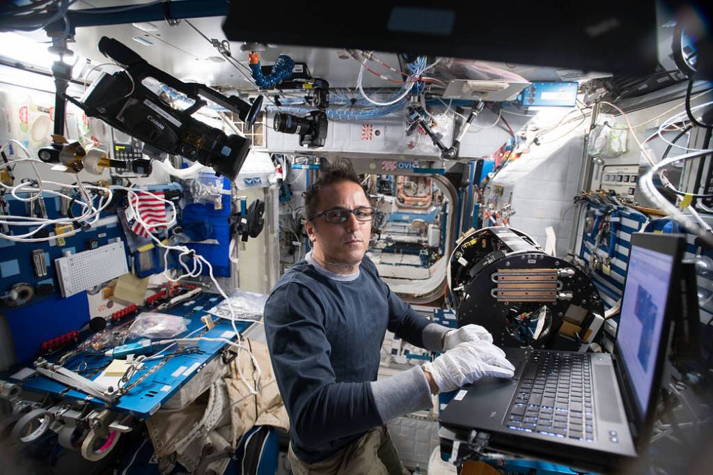 Astronaut Joe Acaba works on Combustion Integrated Rack Gear