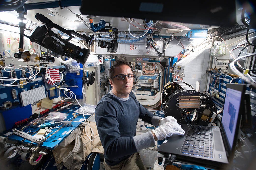 Astronaut Joe Acaba works on Combustion Integrated Rack Gear