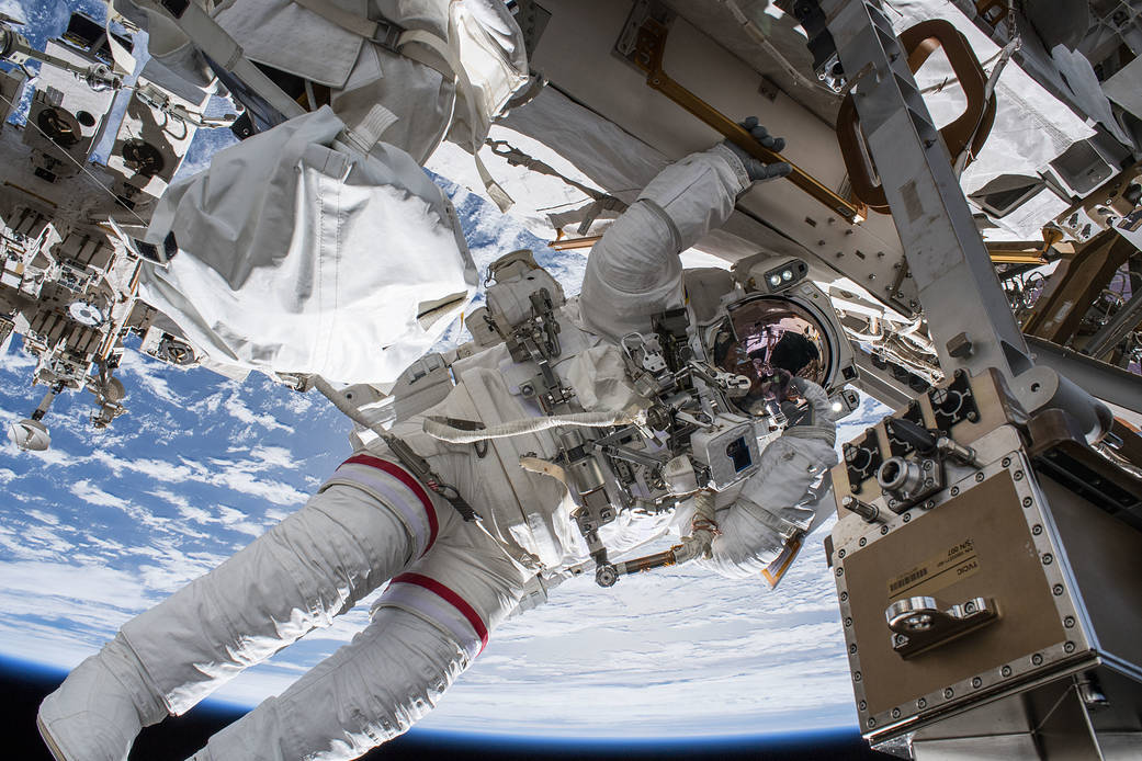Spacewalker Drew Feustel Seemingly Hangs off the Side of the Station
