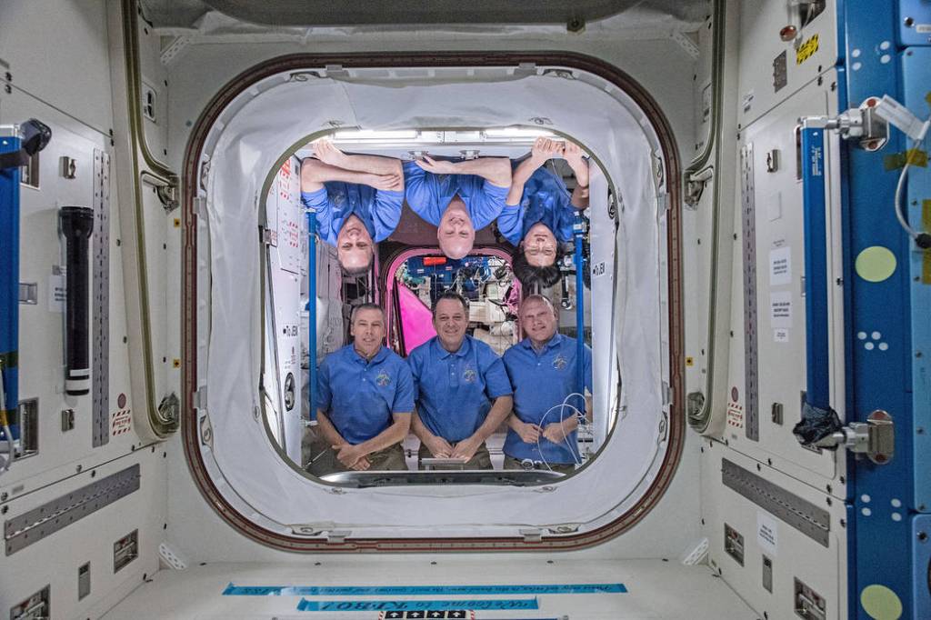 The six-member Expedition 55 crew poses inside the Harmony module