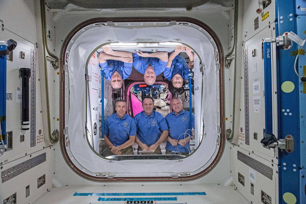 The six-member Expedition 55 crew poses inside the Harmony module