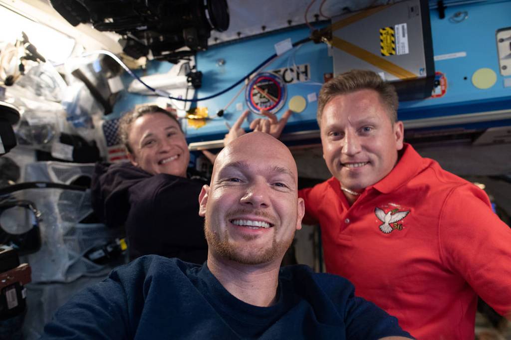 Expedition 56-57 crewmates pose for a portrait