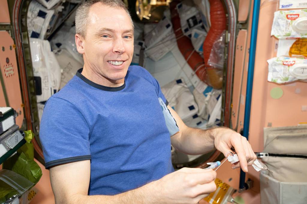 Expedition 56 Commander Drew Feustel conducts research activities