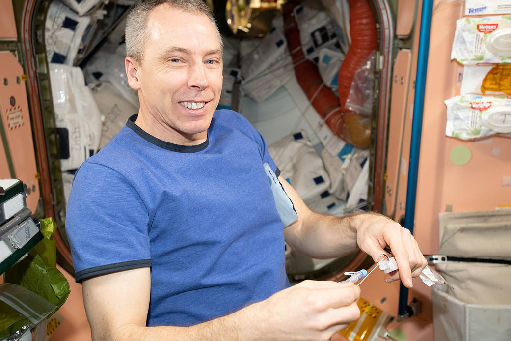 Expedition 56 Commander Drew Feustel conducts research activities