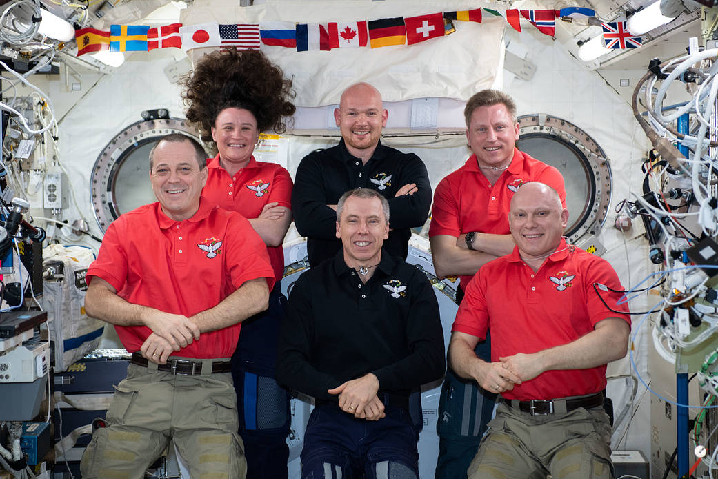 The Expedition 56 crew poses for a portrait in the Kibo laboratory module