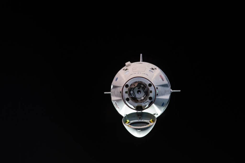 The uncrewed SpaceX Crew Dragon spacecraft on approach to the station’s Harmony module