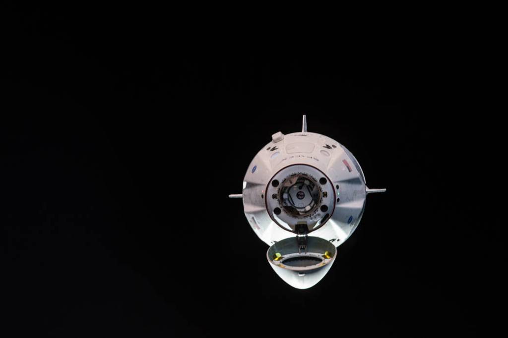 The uncrewed SpaceX Crew Dragon spacecraft on approach to the station’s Harmony module