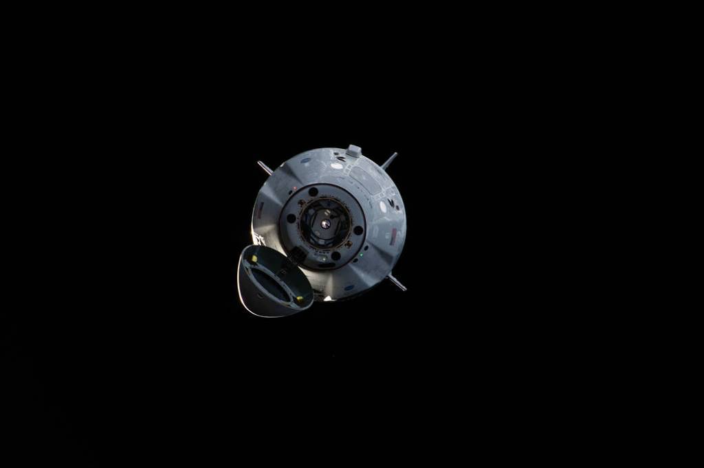 The uncrewed SpaceX Crew Dragon spacecraft on approach to the station’s Harmony module