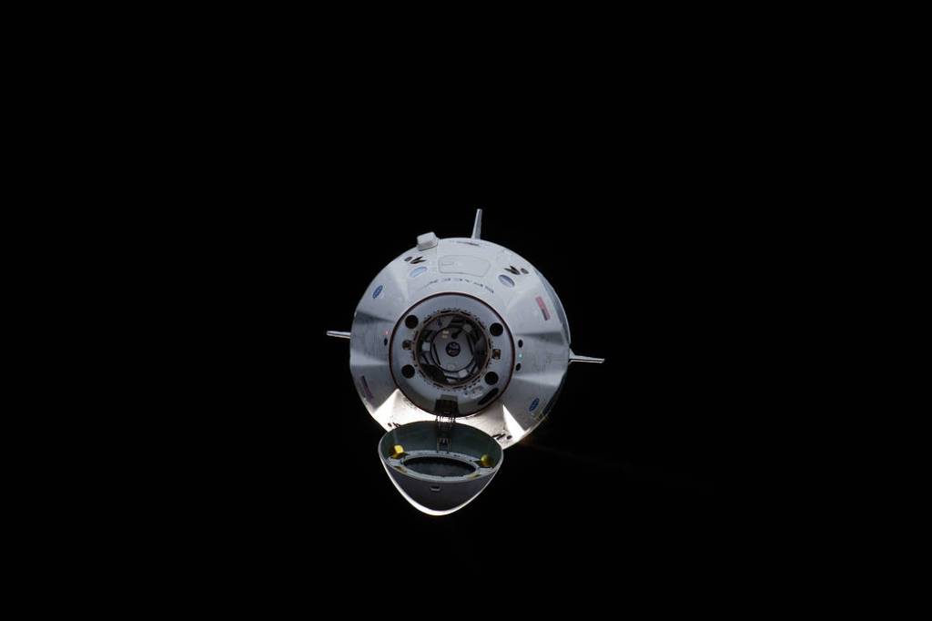 The uncrewed SpaceX Crew Dragon spacecraft on approach to the station’s Harmony module
