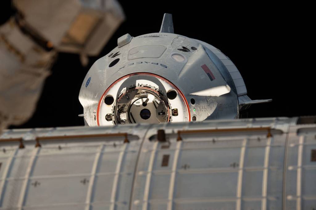 The uncrewed SpaceX Crew Dragon spacecraft on approach to the station’s Harmony module