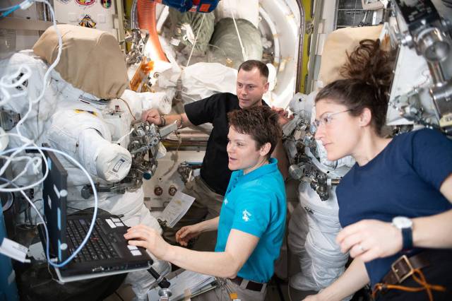 NASA astronauts Nick Hague, Anne McClain and Christina Koch