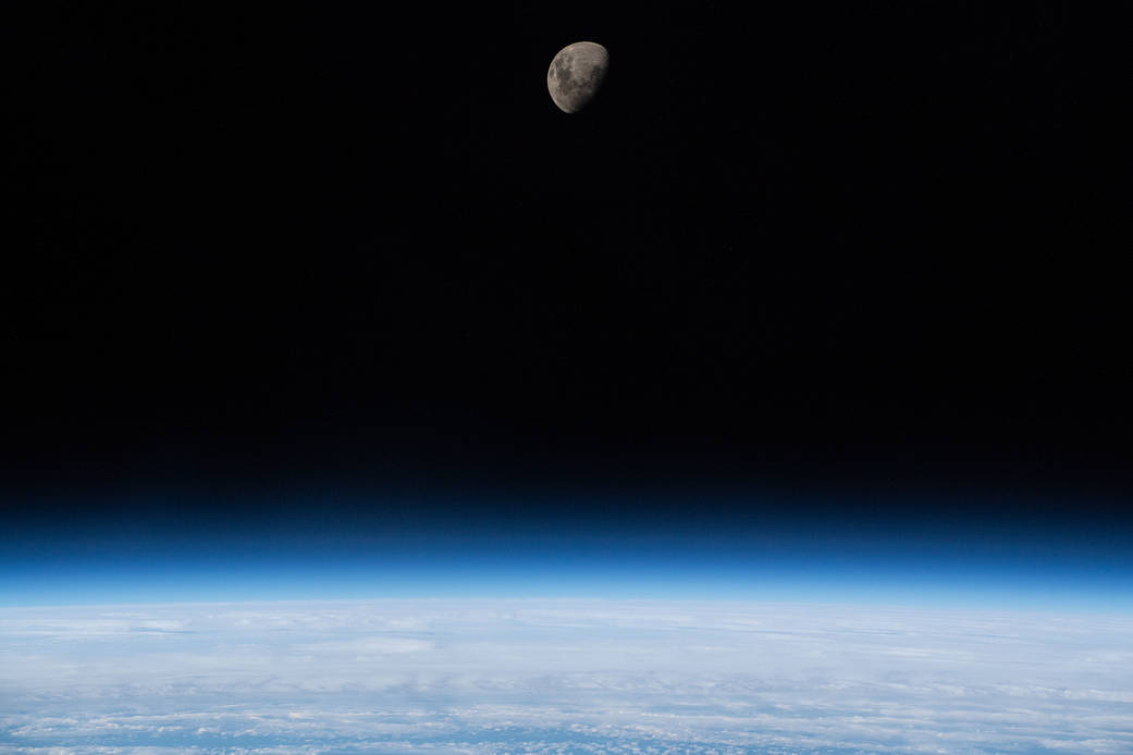 The waxing gibbous moon above Earth's limb
