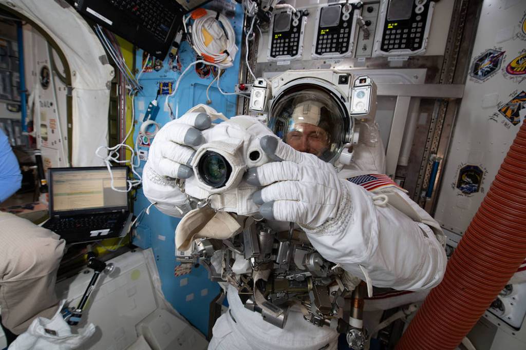 NASA astronaut Nick Hague is fitted in a U.S. spacesuit