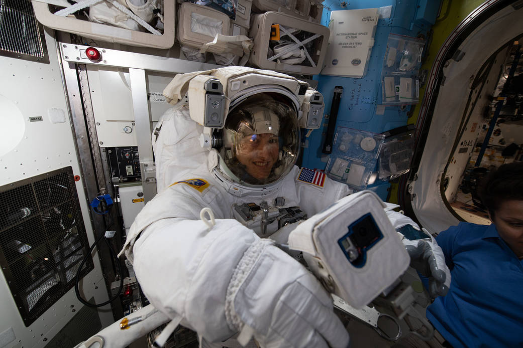 NASA astronaut Christina Koch is fitted in a U.S. spacesuit